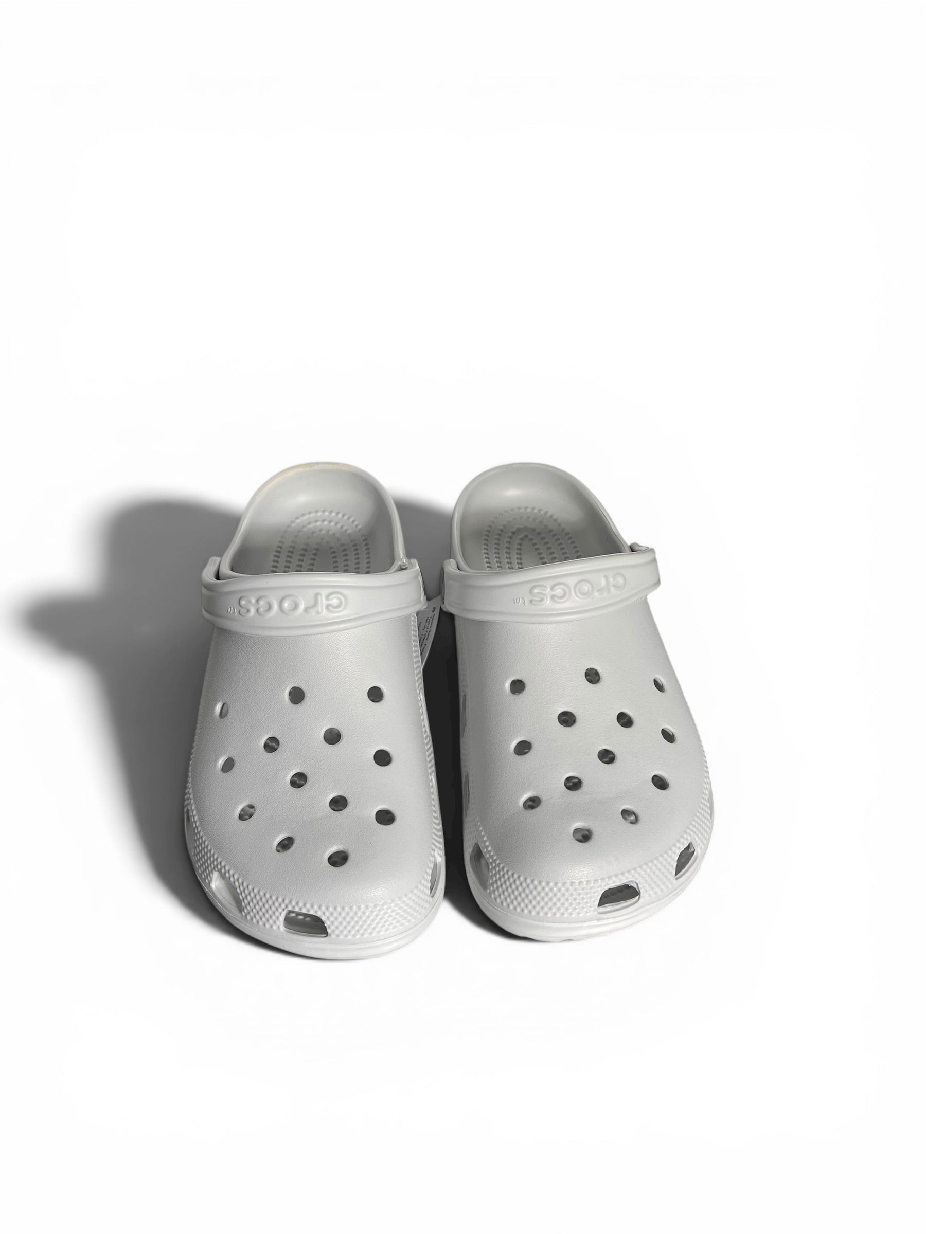 Grey clogs